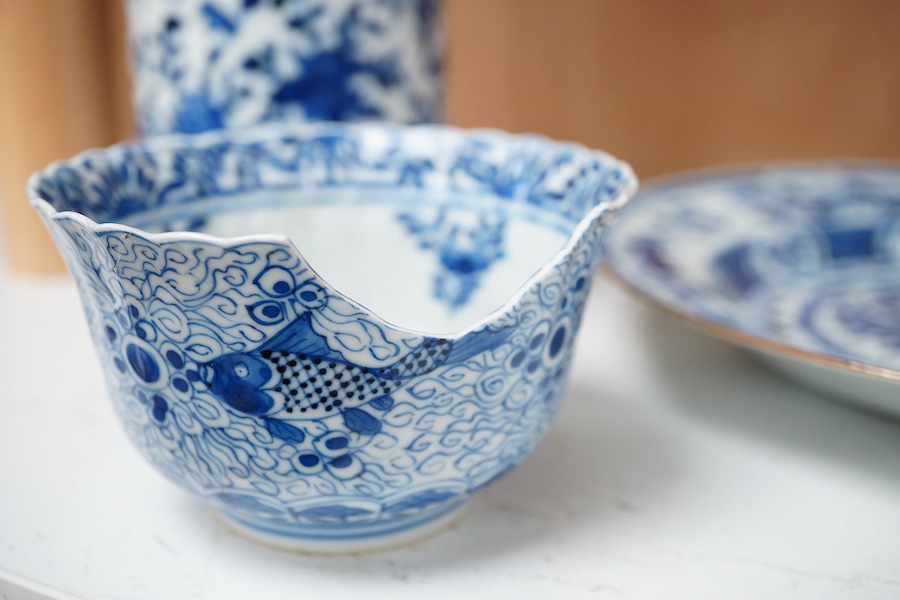 An early 20th century Chinese blue and white sleeve vase, 18th century plate and bowl, tallest 24.5cm